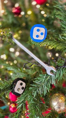 Plone Tune Up Spanner and Plone Lego logos in Christmas treet